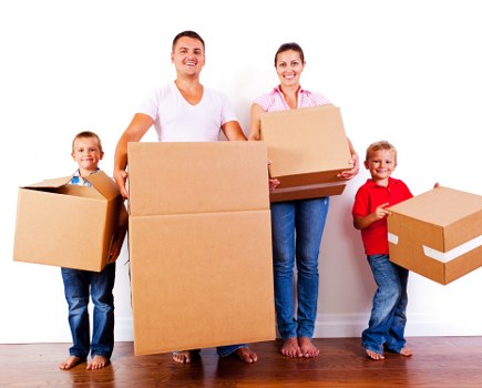 Removal team helping with house removals in East Ham on a residential street