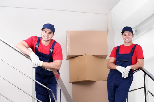 Careful loading of household items for a move in East Ham