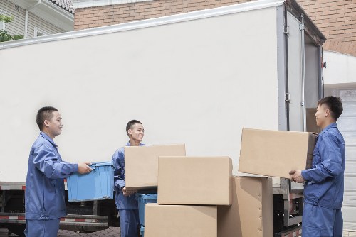 Local packing team preparing household items for safe transport in East Ham