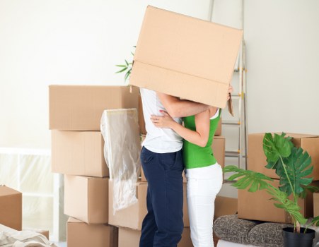 Loading furniture into a van for an East Ham house move