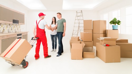 Local moving van helping with flats, houses, and business moves in East Ham