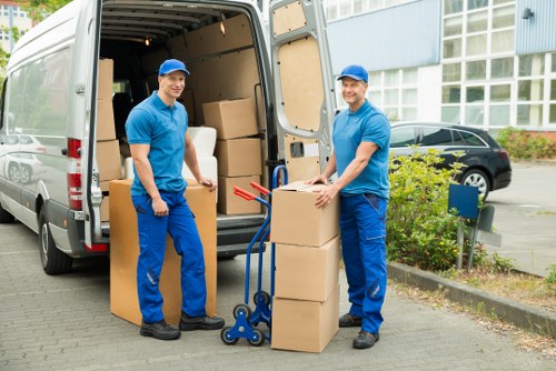 Worker wearing PPE during a van loading operation