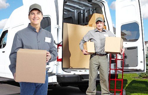 Removal van loading office equipment for a business move in East Ham