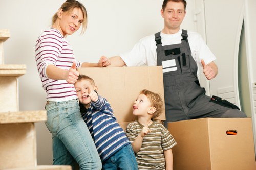 Furniture being carried from a flat in East Ham